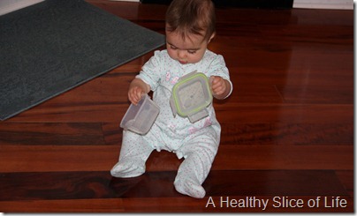 8 months old banging things together